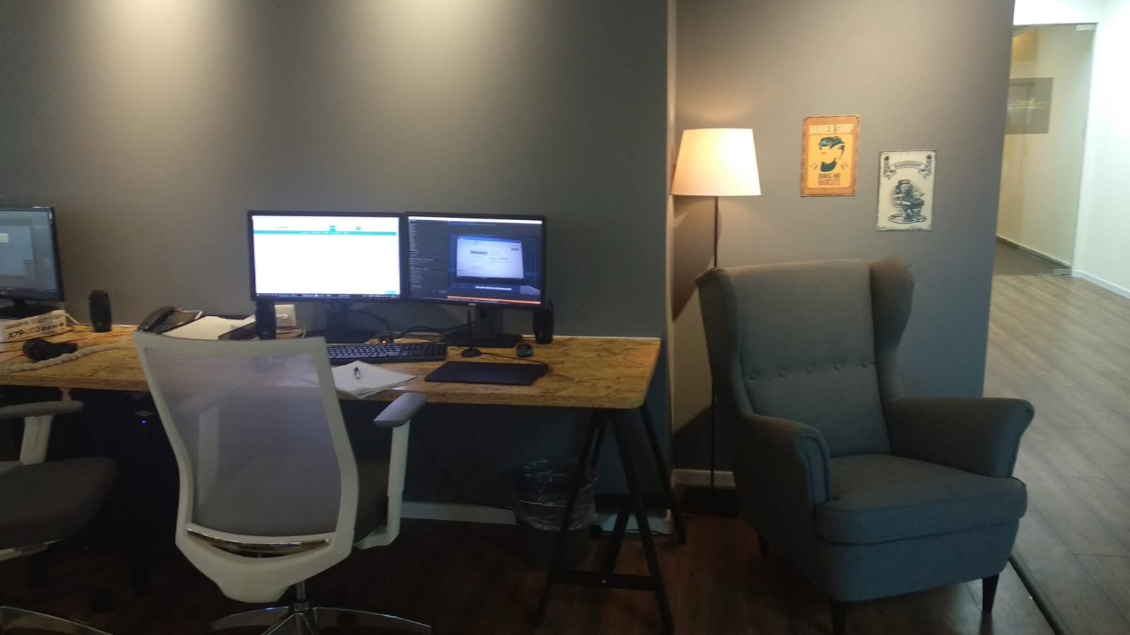 Editing suite with dual monitors at the Creative House studio